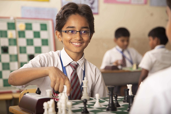 Chess-1 Student Playing Chess Competition