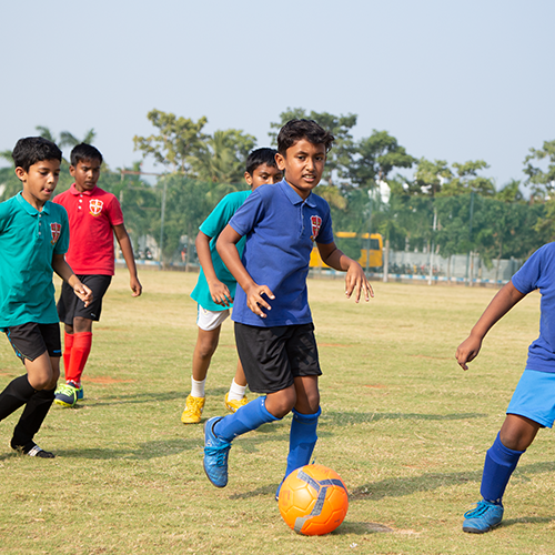 football GISN Students playing Football