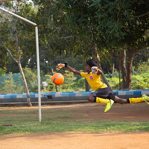 1 Student Playing Football